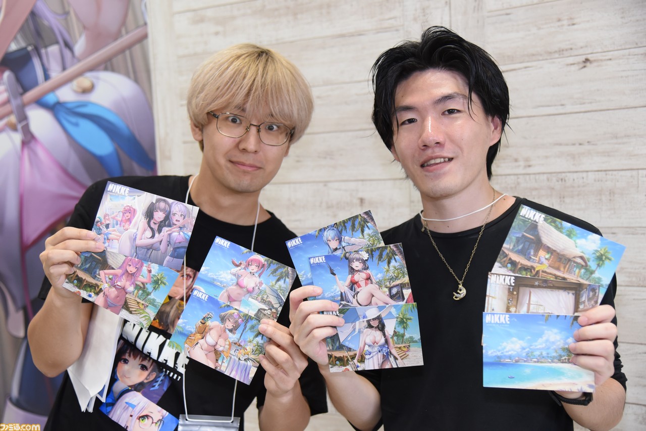 【コミケ】『NIKKE』ブースまとめ。リアル10連ガチャが復刻。シリアルコード付きのポストカードや、水着ニケの登場も【随時更新】